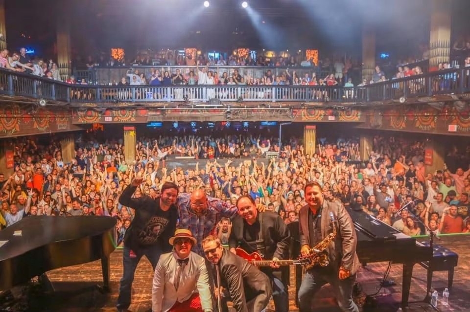 Chuck Credo IV and the band before a packed House of Blues crowd